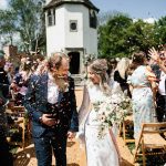Homme House Bride and groom showered with confetti at Homme House outdoor wedding Through the Woods we Ran 21