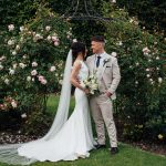 Homme House Wedding couple in Homme House rose garden Zac Gibson Wedding Photography + Film 34