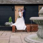 Crondon Park Wedding Venue Couple outside granary 38