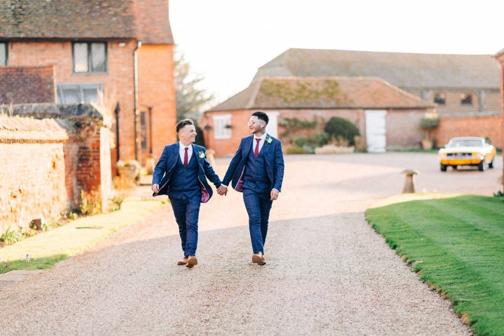 Lillibrooke Manor & Barns wedding venue outdoor shot holding hands