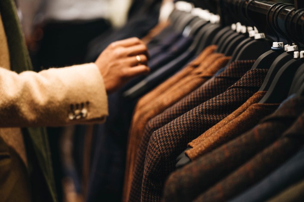 Best Man Duties: The Ultimate Guide Groom Suit rack unsplash 3