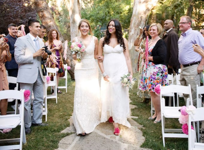 Tips For The Perfect LGBTQ Wedding Walk down aisle credit Next Exit Photography 1