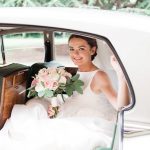 Portfolio Heritage Cars Bride in the car with flowers.jpg 2