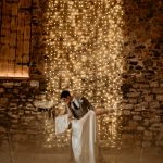 Wild Love Club Photography married in front of fairy lights at Eden Barn