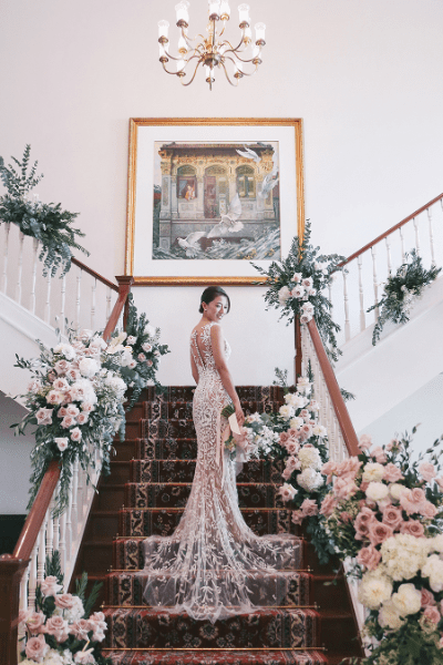 Summer Weddings: Ideas You’ll Want To Steal floral staircase credit Nicolethen Studio 32