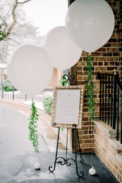 Creative Ways to use Balloons in your Wedding Decor Foliage and a Board 23
