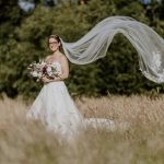 Cottesmore Hotel Golf and Country Club Bride in Long Grasses.jpg 20