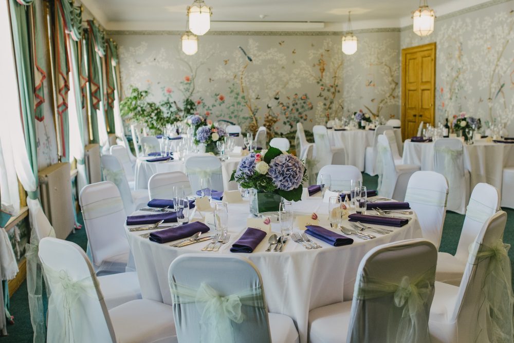Best Wedding Venues in East Sussex WIV Seated Purple Flowers Bows 7