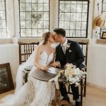 Homme House Bride and groom kiss in Homme House Summerhouse.jpg 15