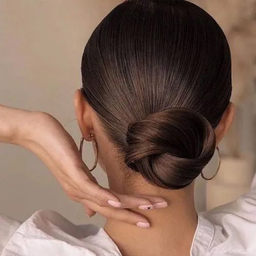 low bun bridesmaid hairstyle