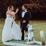 Bride and Groom playing crazy golf supplied by Putt Putt Golf mini golf hire