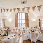 Priodasau Prifysgol Bangor University Weddings weddings hugh owen hall set up with bunting.jpg 3