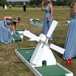 bridesmaids playing putt