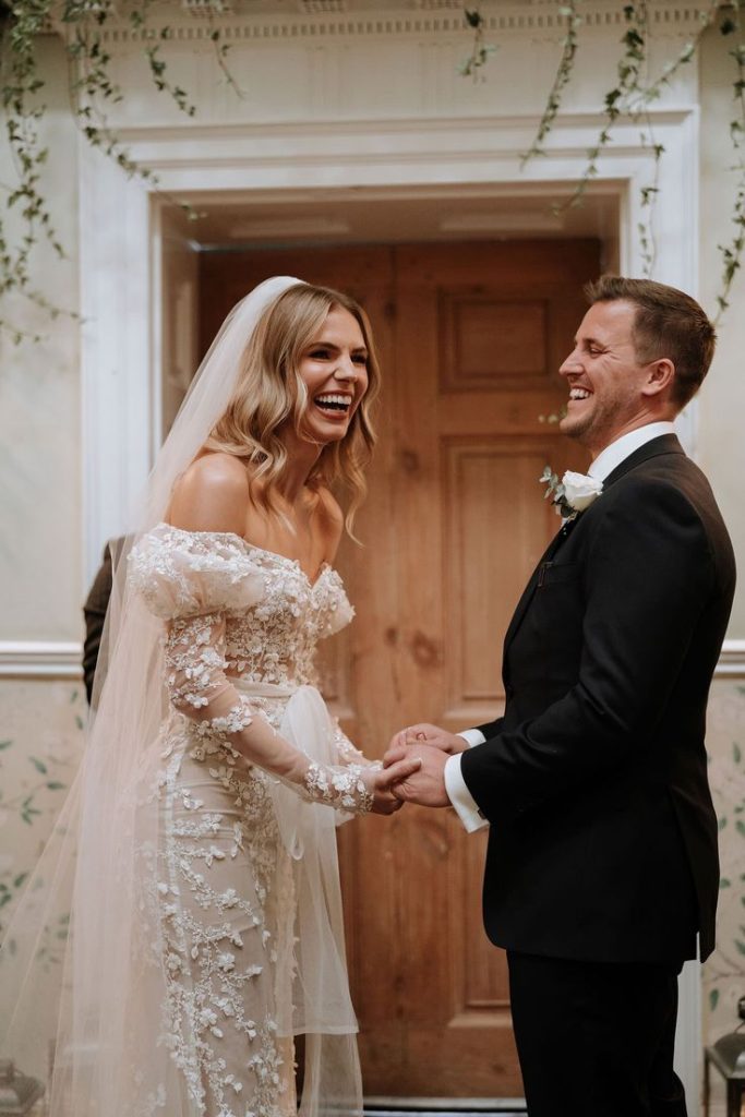 bride & groom laughing