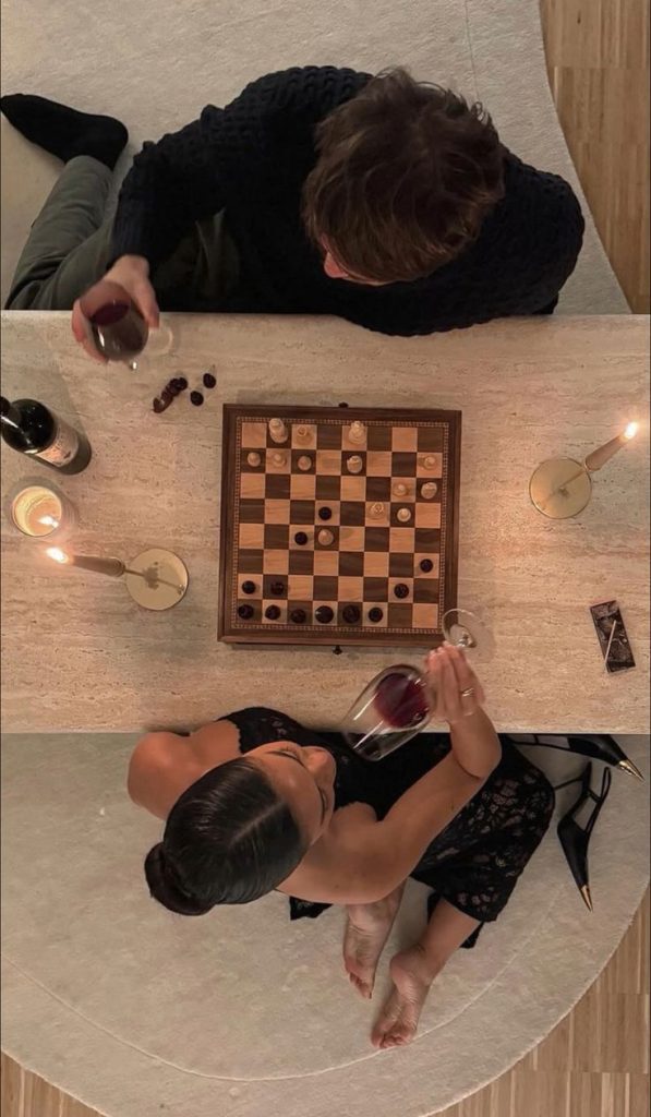 Couple playing chess valentines intimate